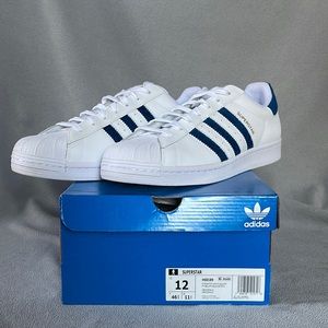 Adidas superstar shoes.